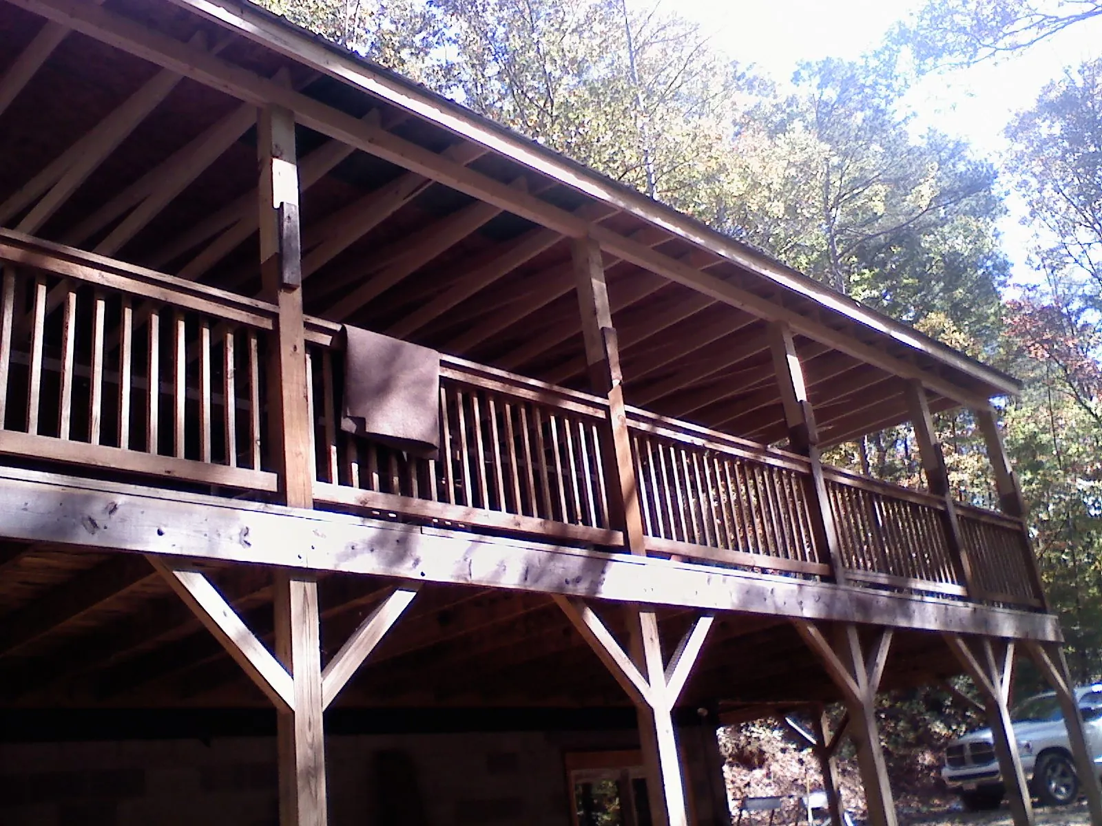 Timber framing under a new elevated porch and deck — Roof Leak Repair in Mamaroneck by Roofing Brothers